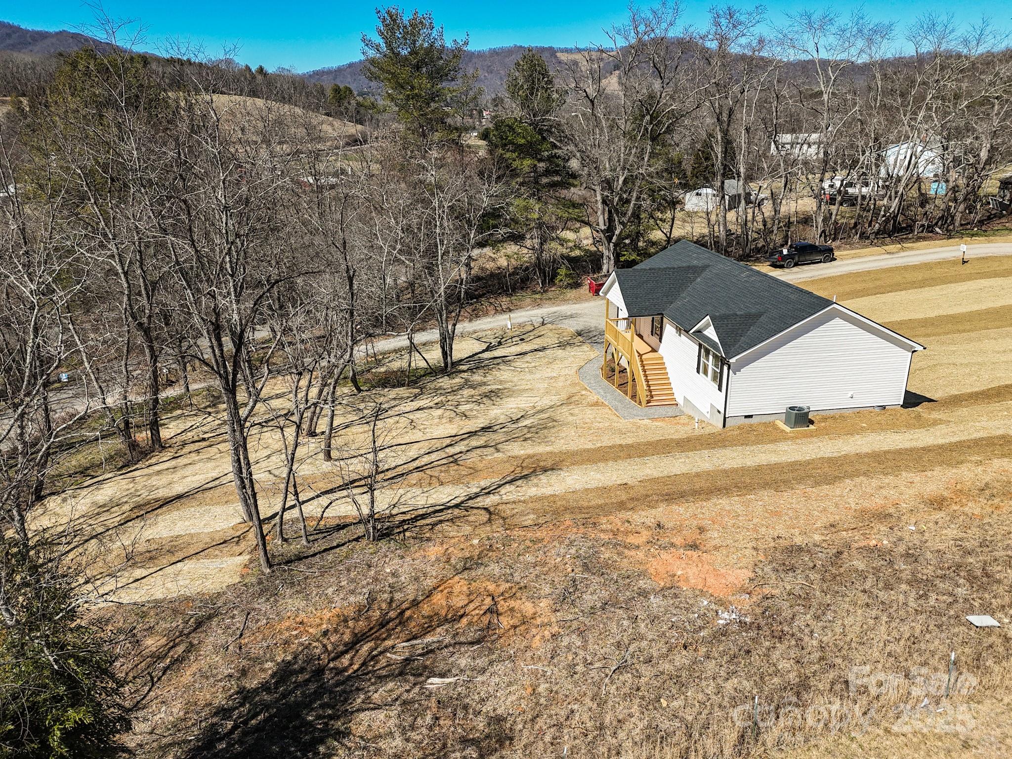 731 Abel Road Canton, NC 28716 - Photo 3 of 46 a view of a yard with wooden fence