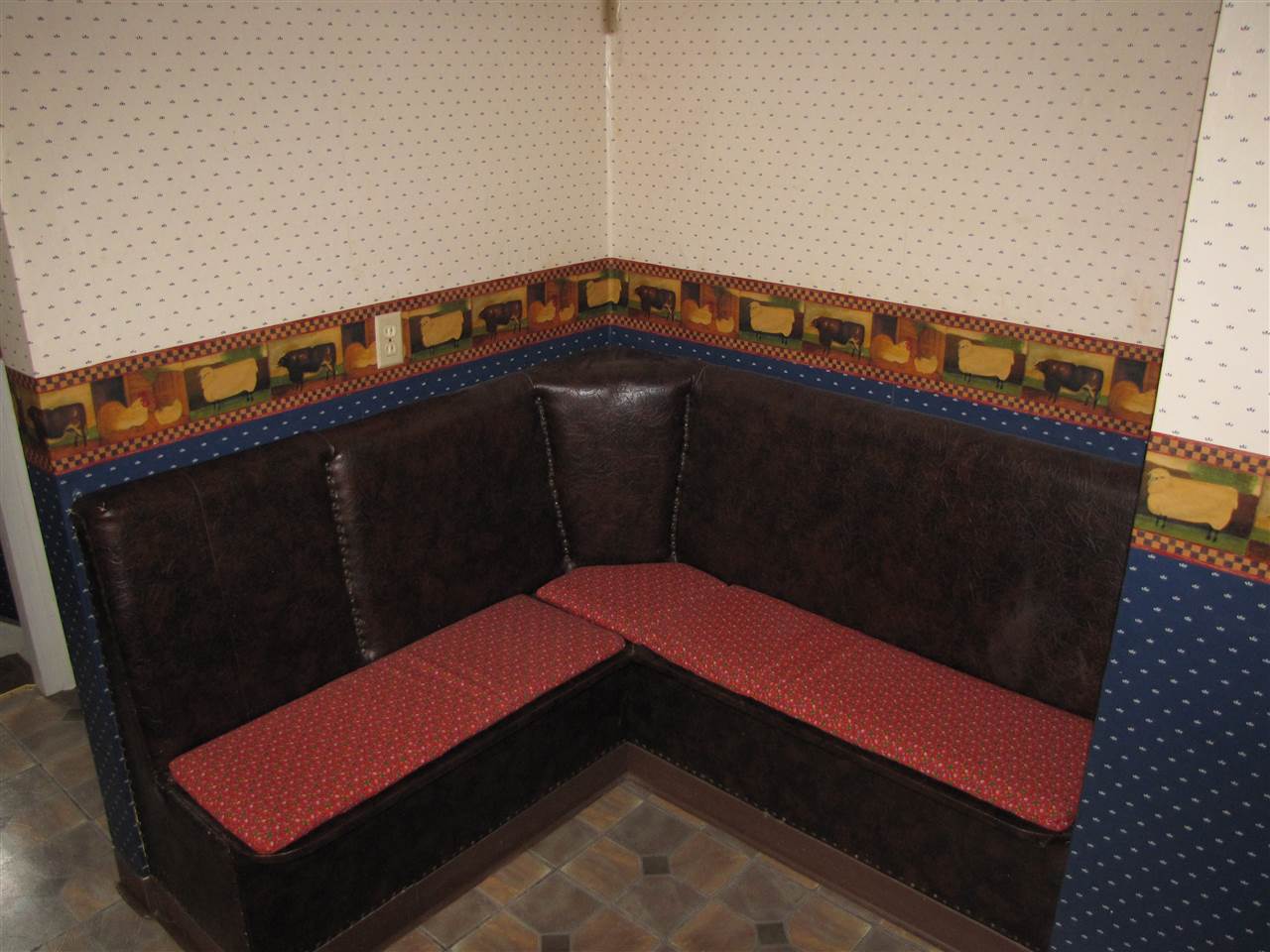 2011 Rural Street Rockford, IL 61107 - Photo 4 of 17 a blue bed sitting in a bedroom next to a cabinet
