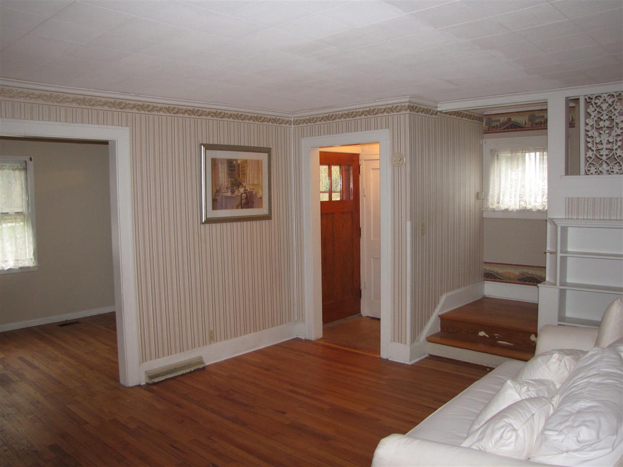 2011 Rural Street Rockford, IL 61107 - Photo 6 of 17 a view of livingroom with hardwood floor and window