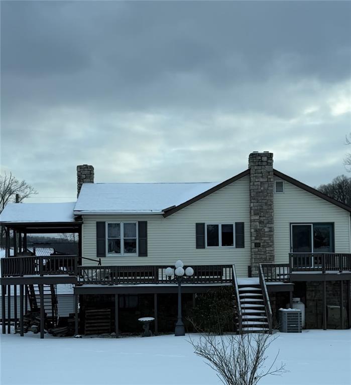 a front view of house with stairs