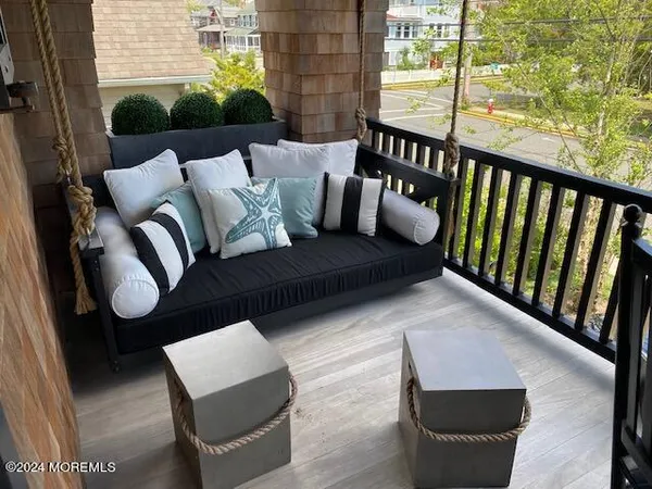 a view of a house with backyard and deck