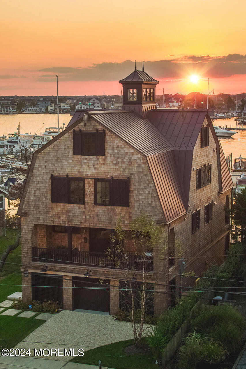 608 Lake Avenue Point Pleasant Beach, NJ 08742 - Photo 3 of 31 a front view of a house with a garden