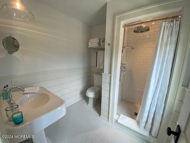 608 Lake Avenue Point Pleasant Beach, NJ 08742 - Photo 31 of 31 a bathroom with a sink toilet and shower