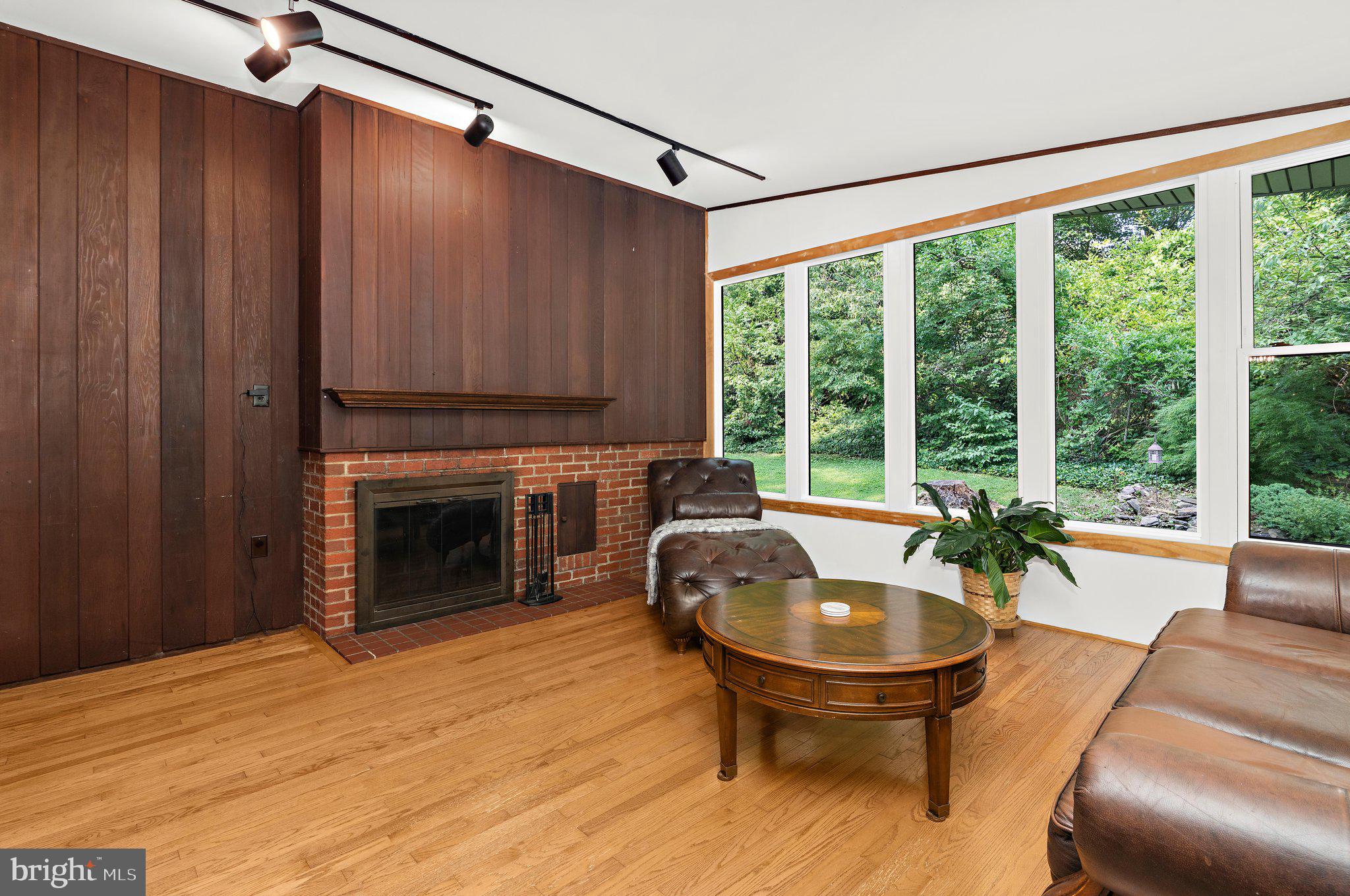 716 Andover Road Linthicum Heights, MD 21090 - Photo 5 of 48 a living room with furniture and a fireplace