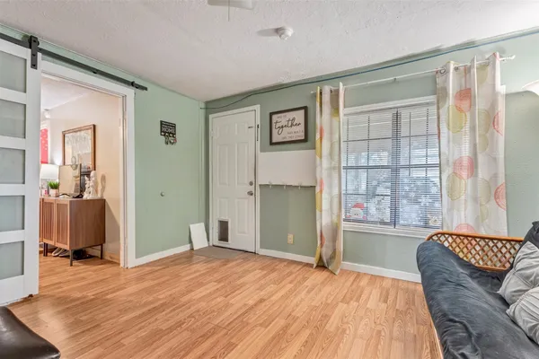 wooden floor and windows in a room