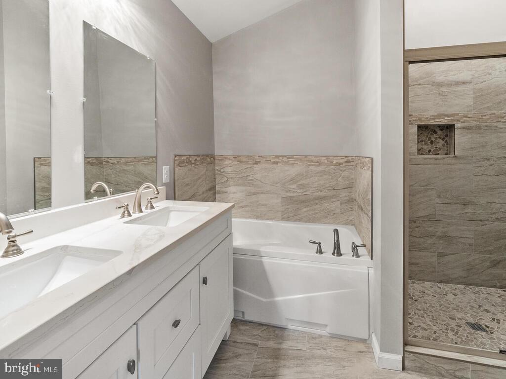 10708 Old Annapolis Road Frederick, MD 21701 - Photo 15 of 28 Primary Suite Full Bath w/ Tub & Walk-in Shower