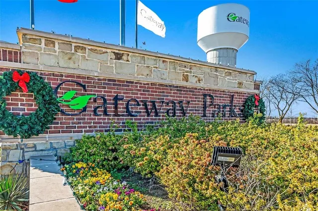 a front view of a building with garden