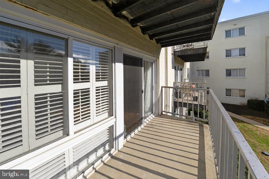 1005 Chillum Road, Unit 207 Hyattsville, MD 20782 - Photo 14 of 21 a view of a balcony with wooden floor