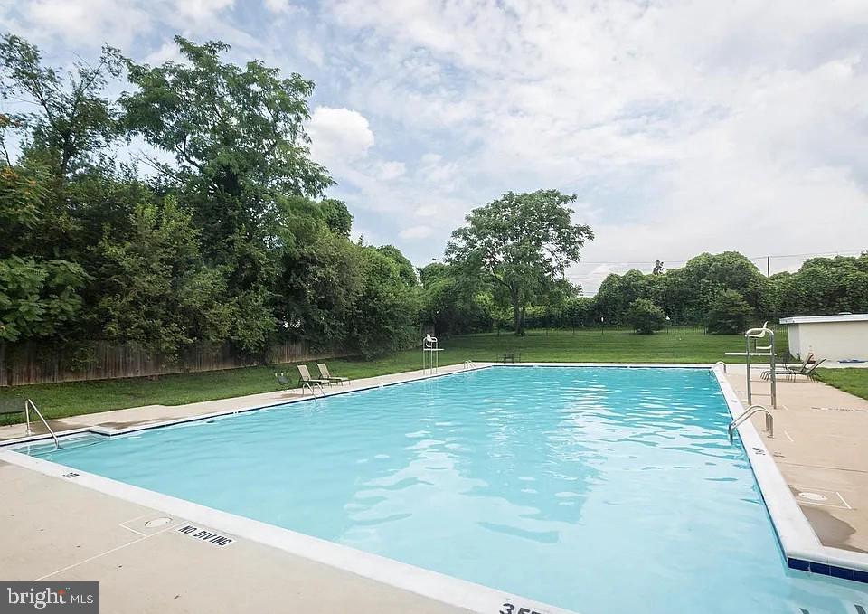 1005 Chillum Road, Unit 207 Hyattsville, MD 20782 - Photo 16 of 21 a view of a swimming pool and a yard
