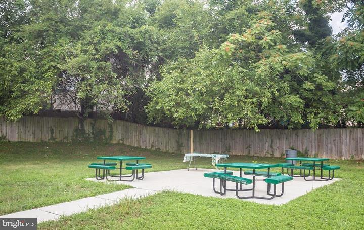 1005 Chillum Road, Unit 207 Hyattsville, MD 20782 - Photo 17 of 21 a view of a chair and table in the garden