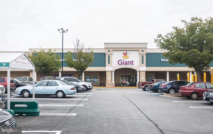 1005 Chillum Road, Unit 207 Hyattsville, MD 20782 - Photo 20 of 21 a front view of a house with cars parked