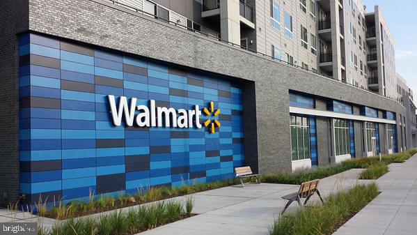 1005 Chillum Road, Unit 207 Hyattsville, MD 20782 - Photo 21 of 21 a front view of a building with a garden and plants