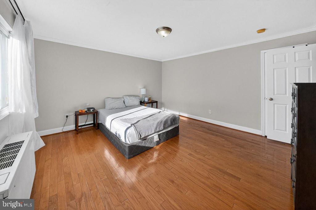 1005 Chillum Road, Unit 207 Hyattsville, MD 20782 - Photo 7 of 21 a room with a bed and a table