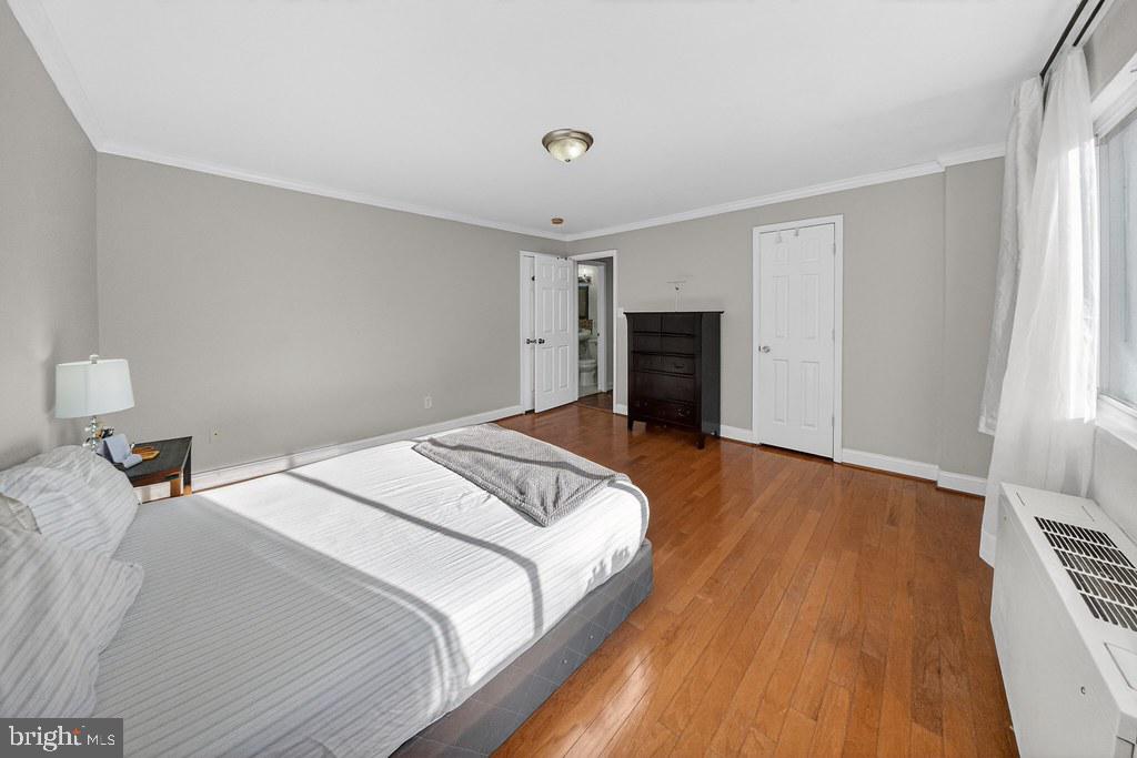 1005 Chillum Road, Unit 207 Hyattsville, MD 20782 - Photo 8 of 21 a bedroom with a bed and a window