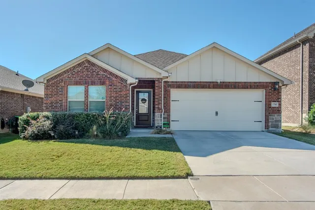 a front view of house with yard