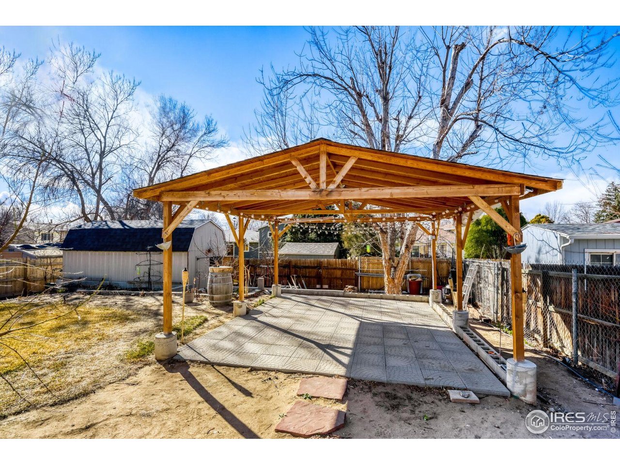 223 Fifth Street Firestone, CO 80520 - Photo 2 of 27 a view of a chairs and tables in the patio