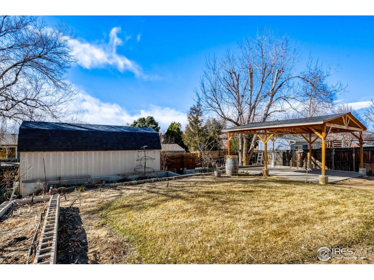 223 Fifth Street Firestone, CO 80520 - Photo 2 of 27 a view of a house with a big yard