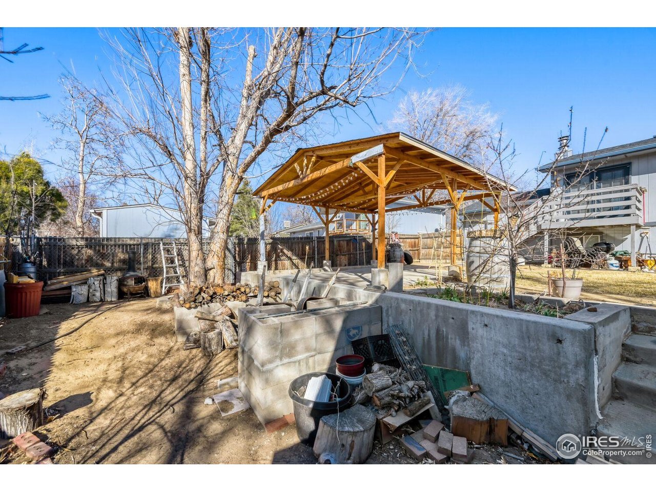 223 Fifth Street Firestone, CO 80520 - Photo 26 of 27 a view of a house with backyard and sitting area