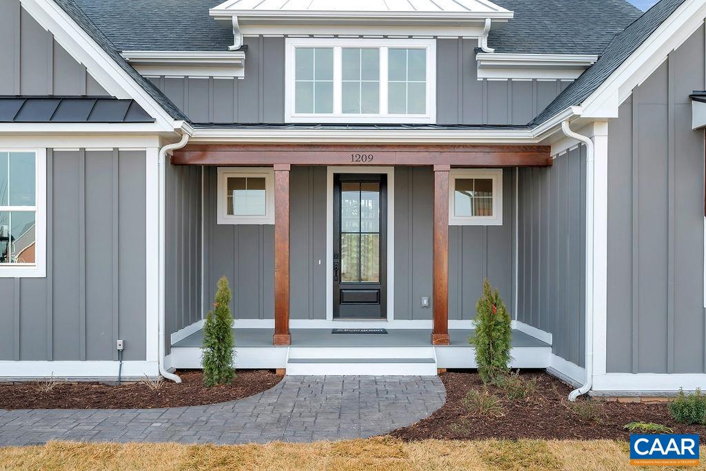 3 B Rothwell Lane, Unit LOT 3B Crozet, VA 22932 - Photo 24 of 29 a front view of a house with garden