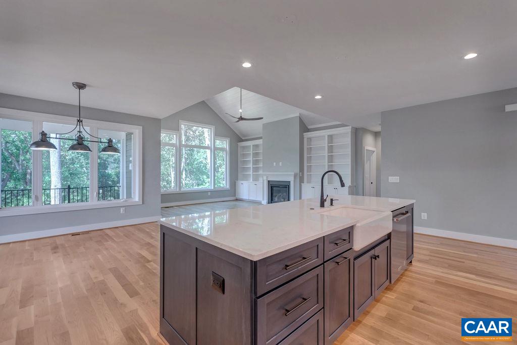 3 B Rothwell Lane, Unit LOT 3B Crozet, VA 22932 - Photo 7 of 29 a kitchen with a stove and a sink