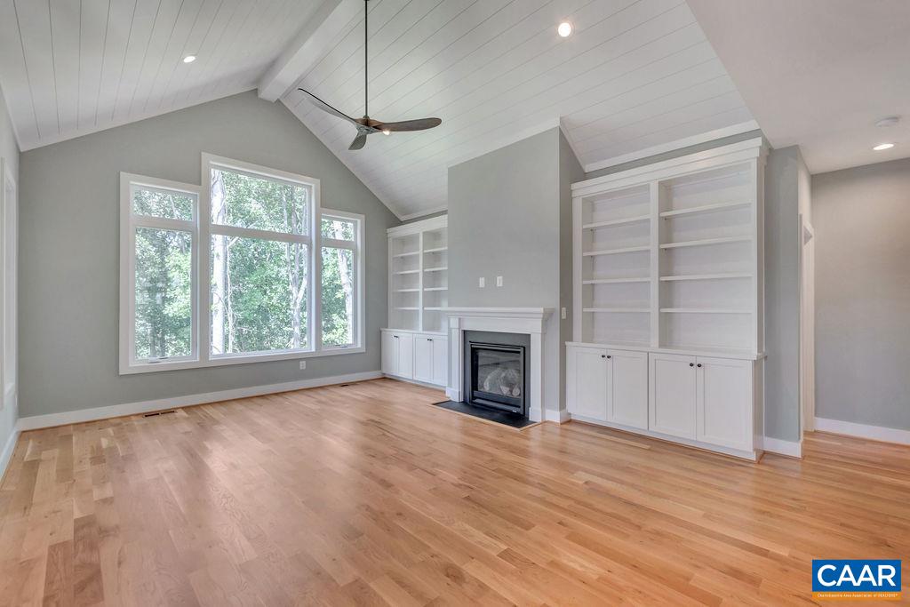 3 B Rothwell Lane, Unit LOT 3B Crozet, VA 22932 - Photo 10 of 29 a view of an empty room with a fireplace and a window