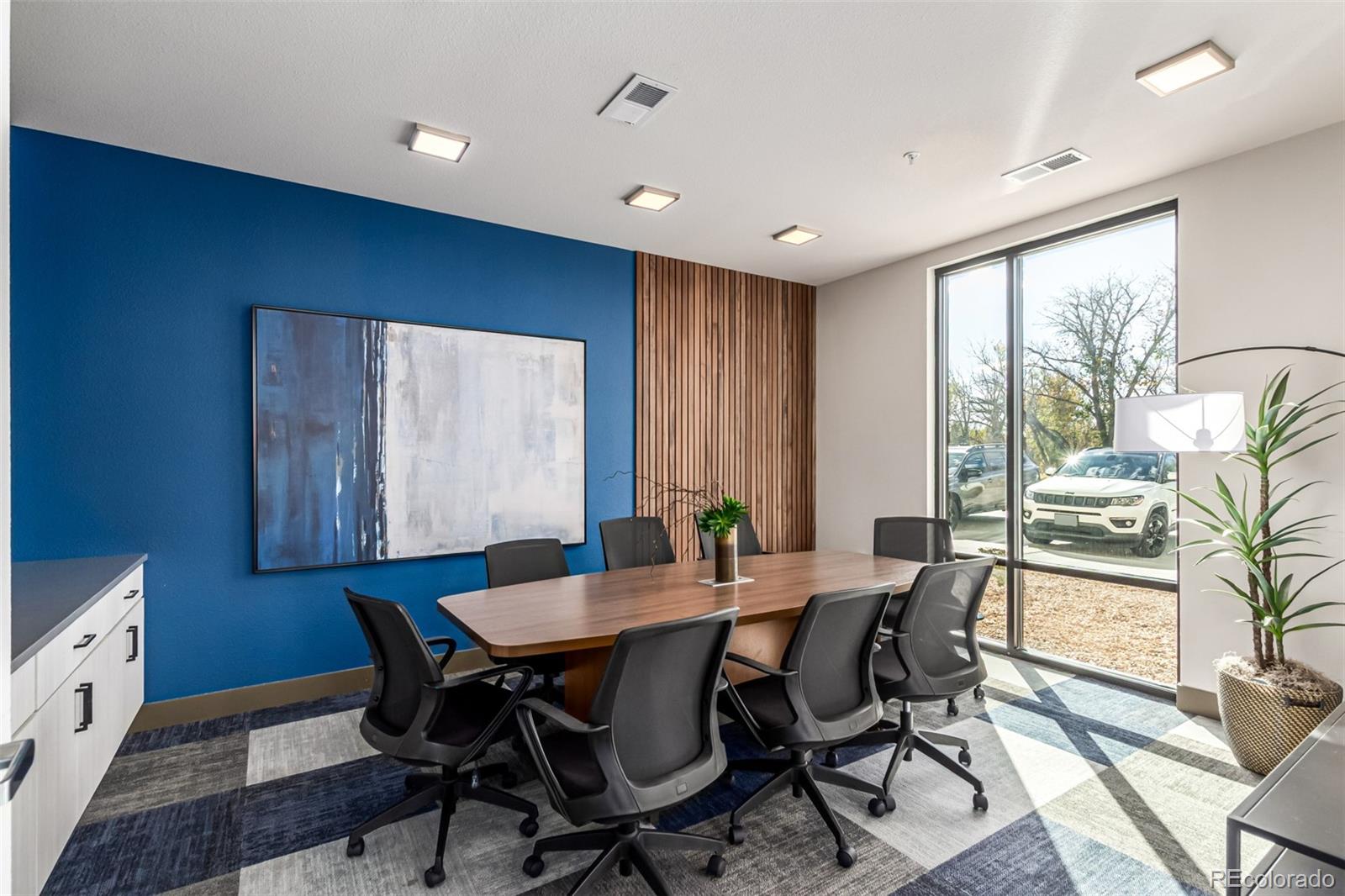 9287 Twenty Mile Road, Unit 204 Parker, CO 80134 - Photo 27 of 30 a view of a dining room with furniture window and outside view