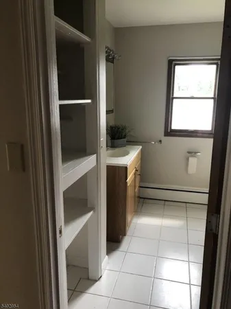 a storage room with washer and dryer