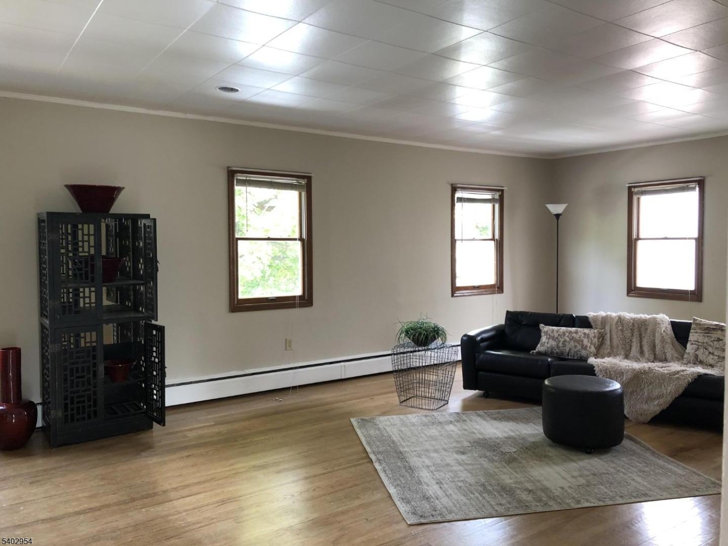 157 Highway 31 Washington, NJ 07882 - Photo 7 of 14 a living room with furniture window and wooden floor
