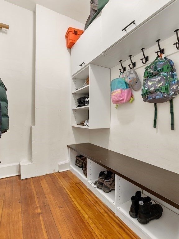640 Washington Street, Unit 1 Brookline, MA 02446 - Photo 14 of 18 a kitchen with stainless steel appliances a sink and cabinets