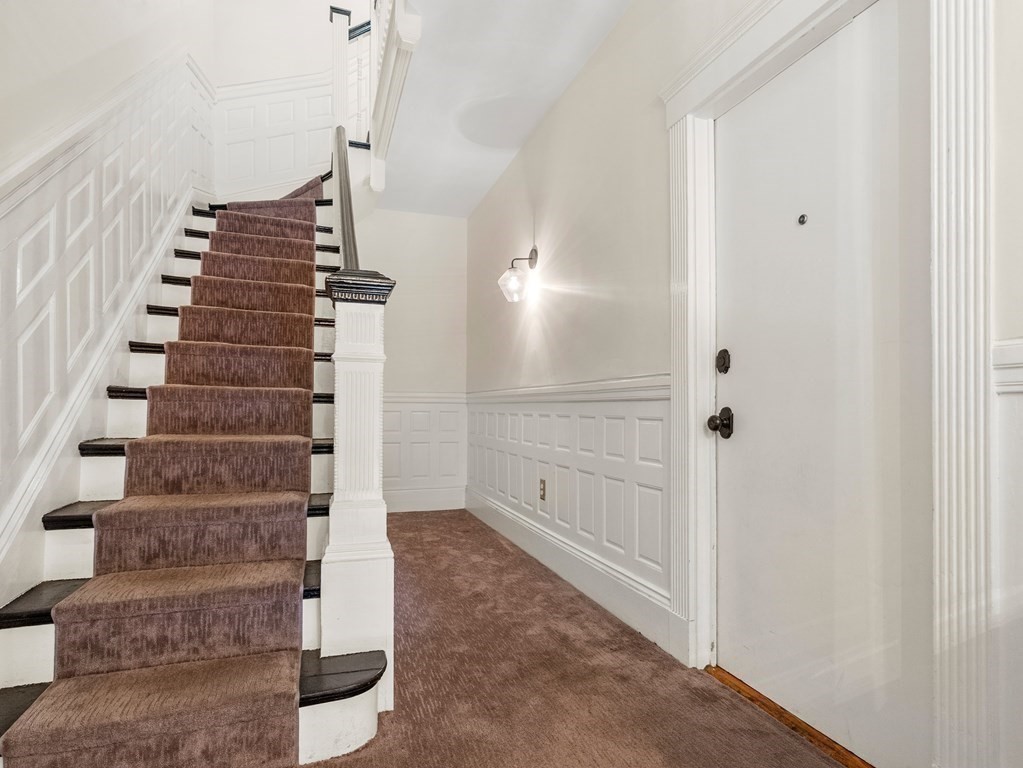 640 Washington Street, Unit 1 Brookline, MA 02446 - Photo 16 of 18 a view of an entryway with wooden floor