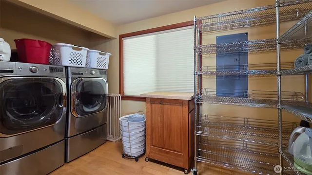 a utility room with dryer and washer