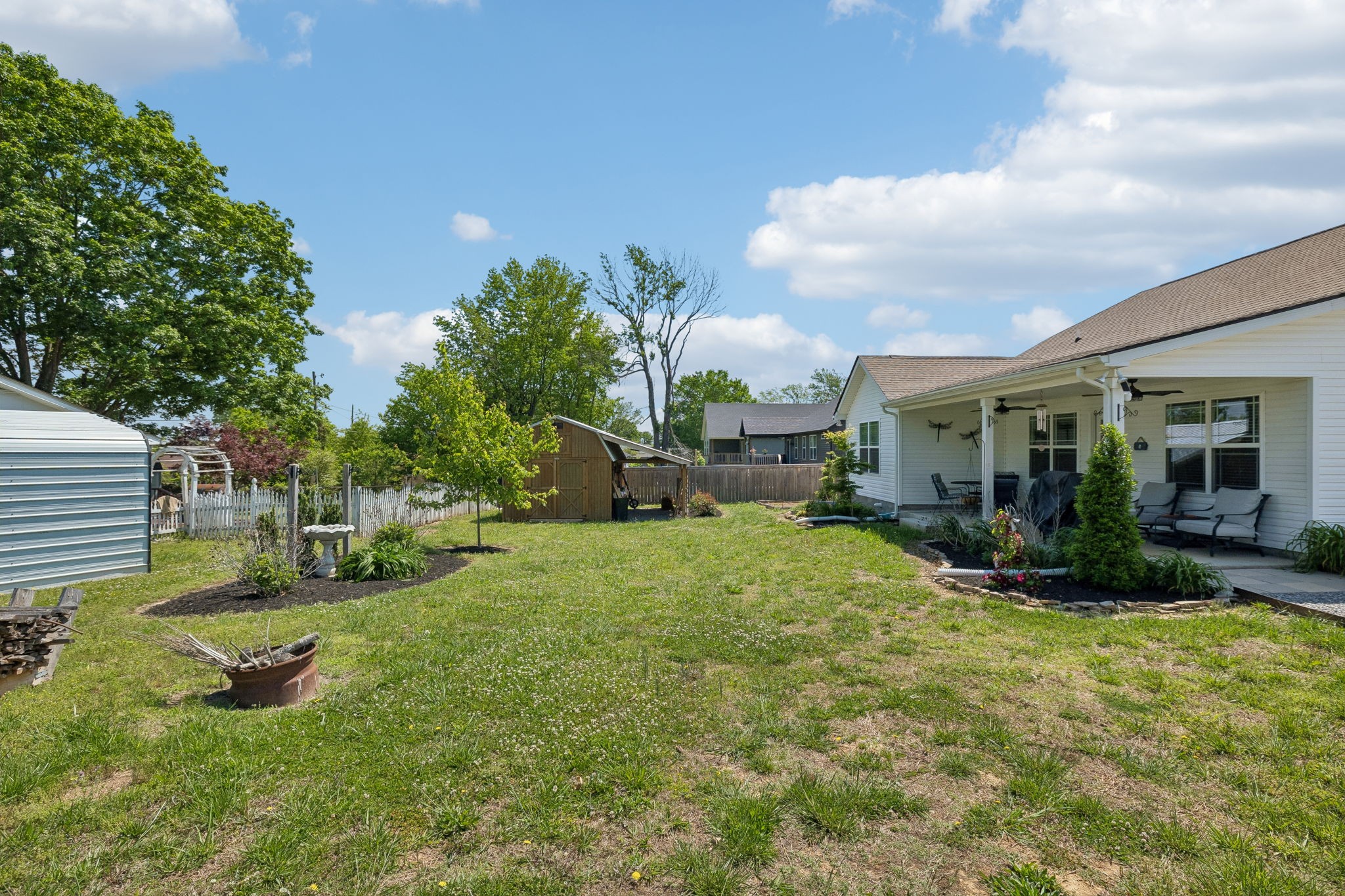 1180 Shaylee Drive Springfield, TN 37172 - Photo 35 of 46 a view of a house with backyard porch and sitting area