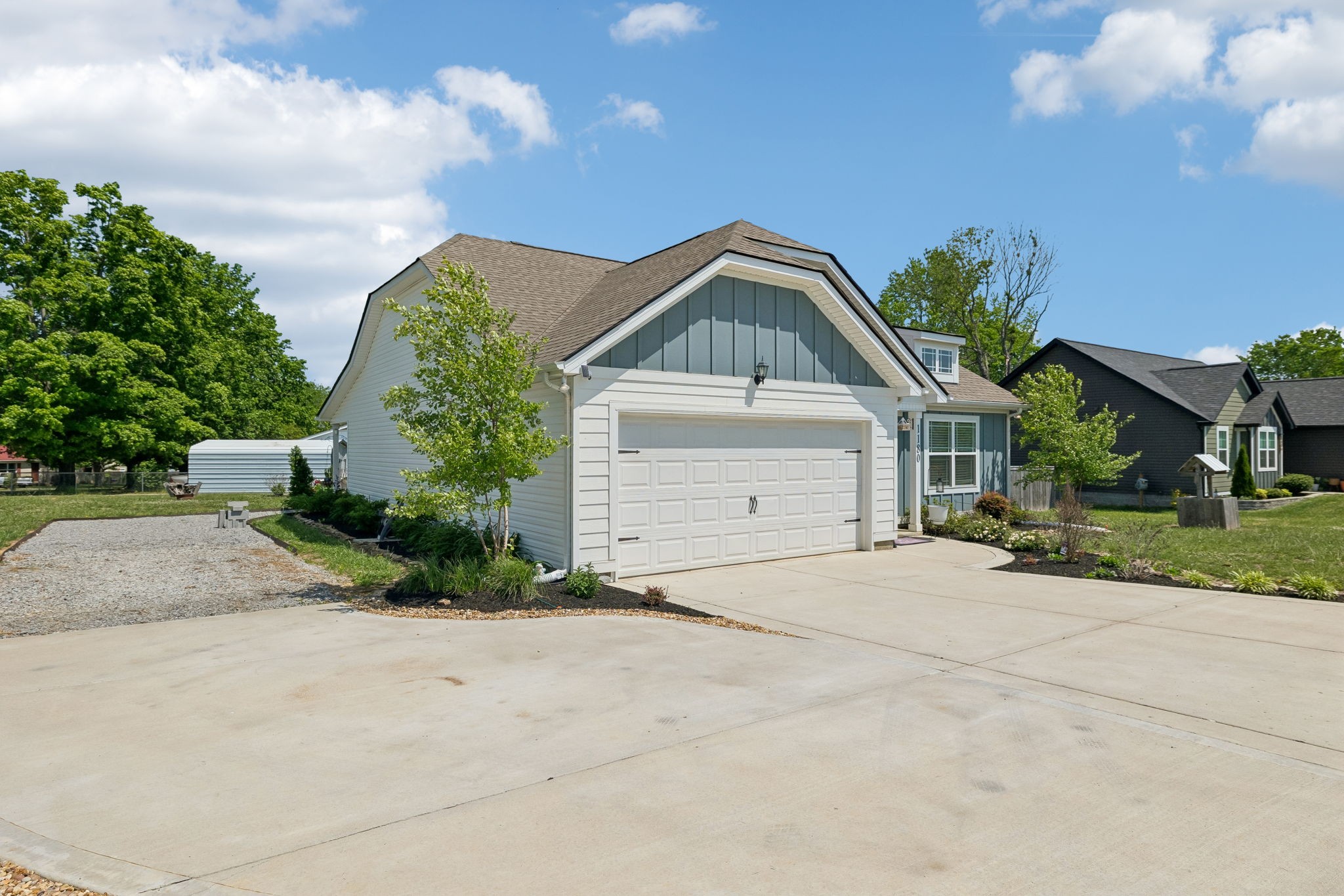 1180 Shaylee Drive Springfield, TN 37172 - Photo 6 of 46 a front view of a house with a yard and garage