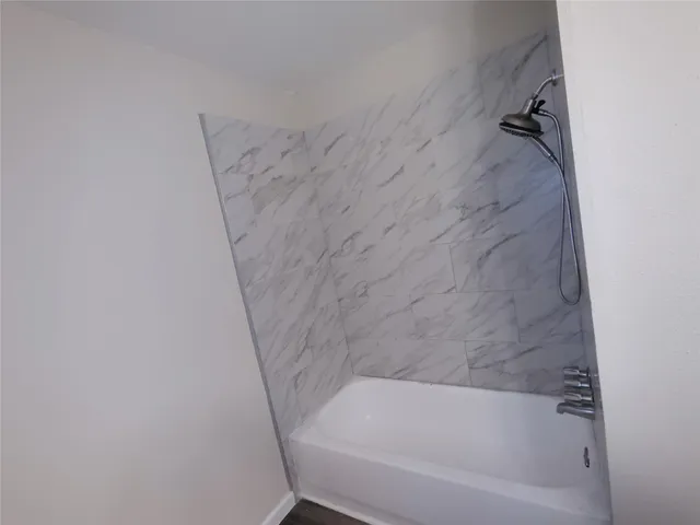 a bathroom with a tub
