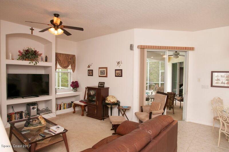 131 Haines Road Southwest Palm Bay, FL 32908 - Photo 14 of 24 Family Room Entrance to the Porch