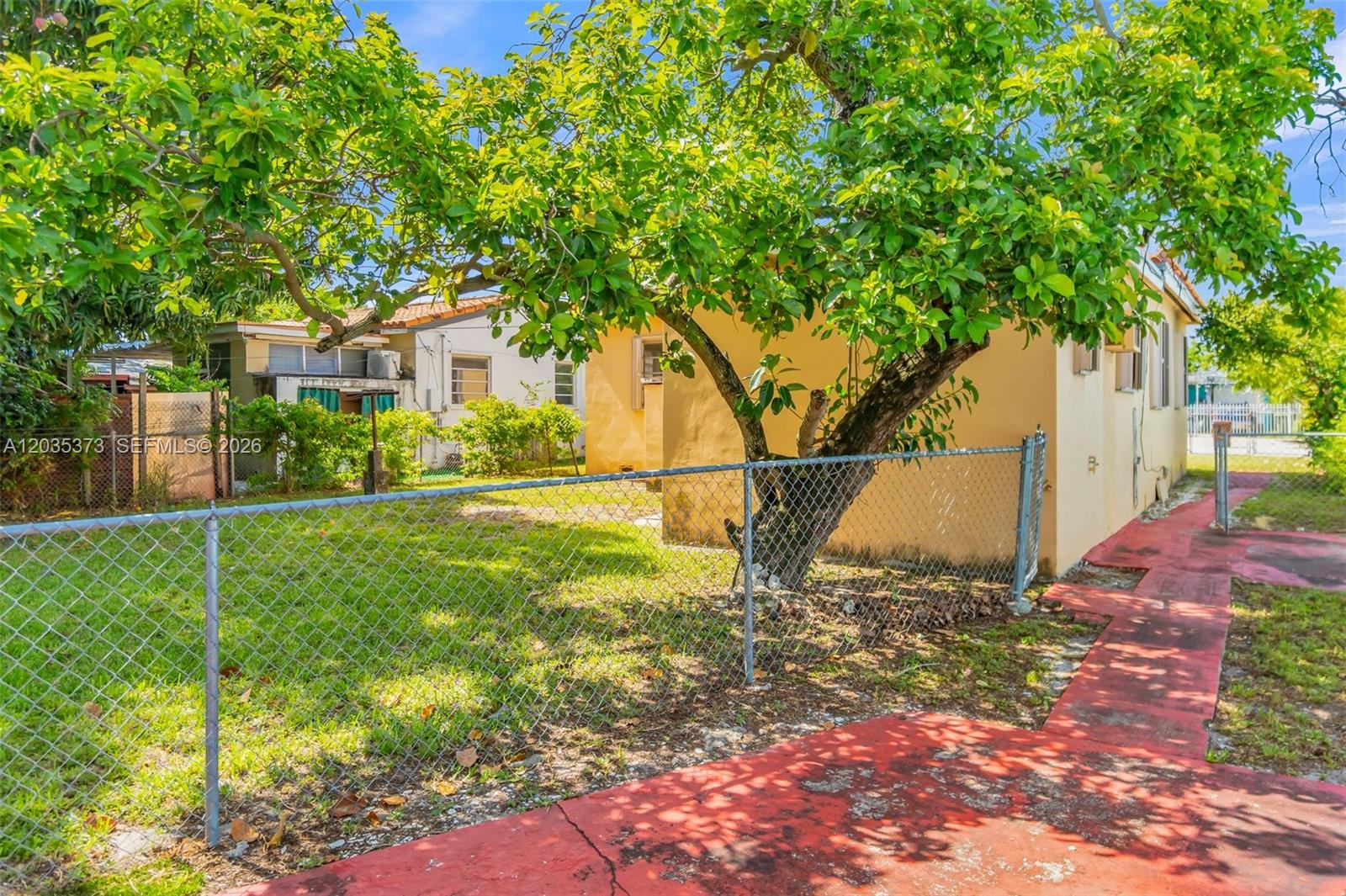 151 East 16th Street Hialeah, FL 33010 - Photo 24 of 37 Back yard and side of home
