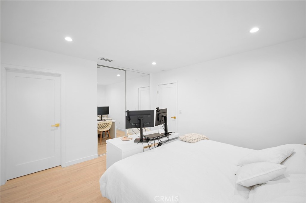 6625 Shadygrove Street Tujunga, CA 91042 - Photo 17 of 25 a bed room with a bed a mirror