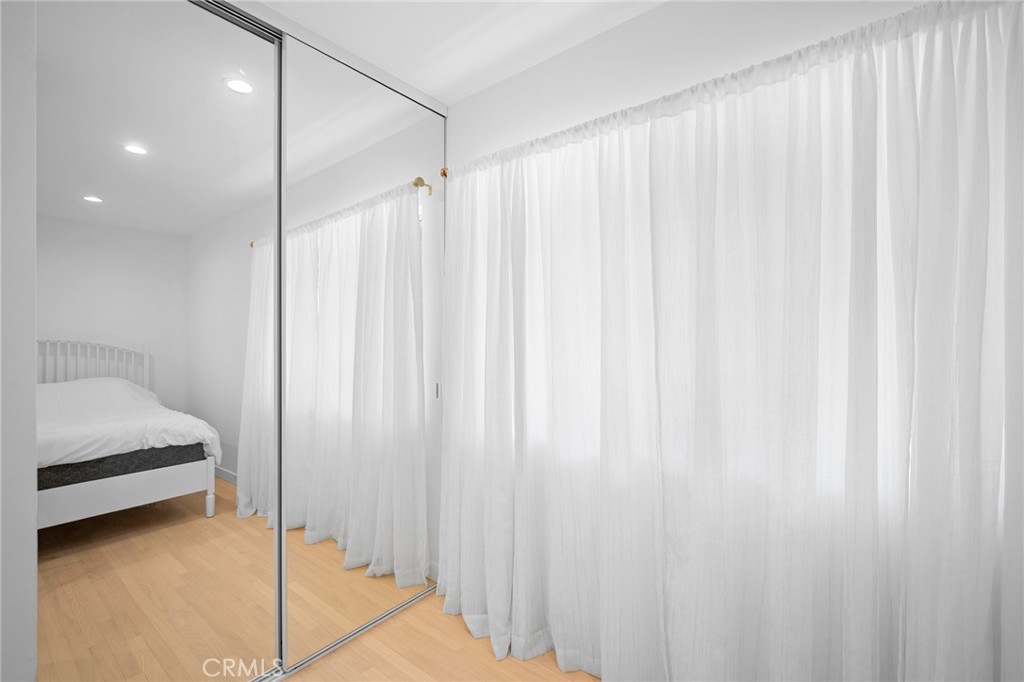 6625 Shadygrove Street Tujunga, CA 91042 - Photo 20 of 25 a en suite bathroom with a shower curtain and a shower curtain