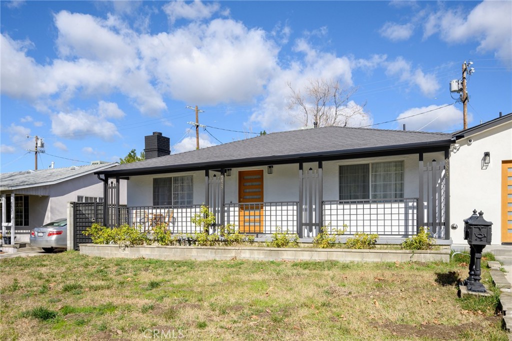 6625 Shadygrove Street Tujunga, CA 91042 - Photo 2 of 25 a front view of a house with garden