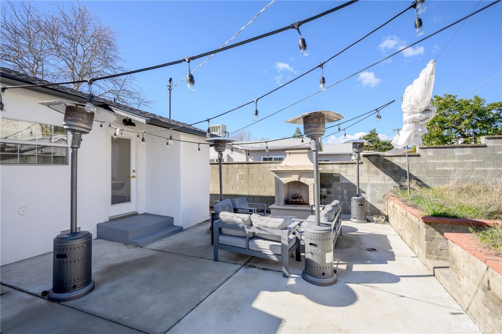 6625 Shadygrove Street Tujunga, CA 91042 - Photo 24 of 25 a view of a patio with table and chairs