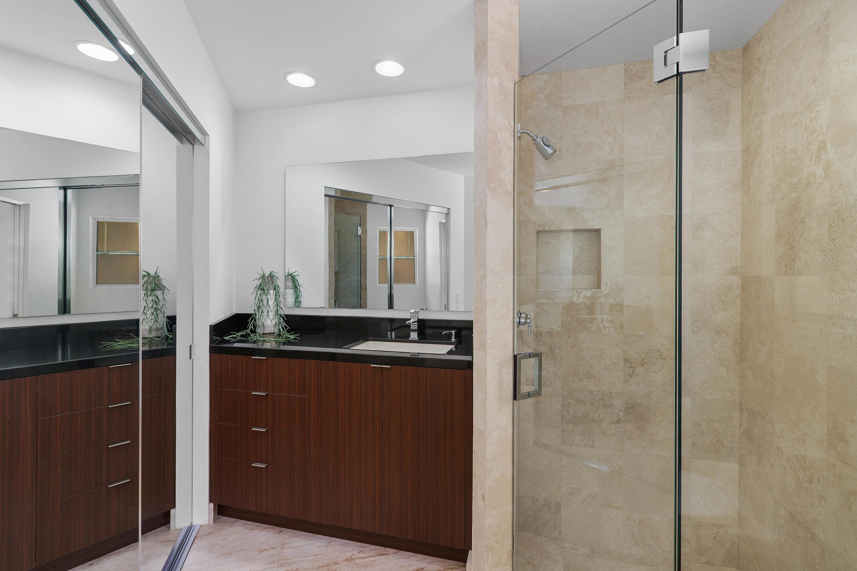 40231 Club View Drive Rancho Mirage, CA 92270 - Photo 21 of 53 a bathroom with a granite countertop sink a mirror and a shower