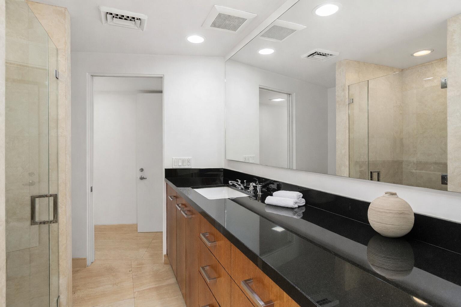 40231 Club View Drive Rancho Mirage, CA 92270 - Photo 22 of 53 a bathroom with a granite countertop sink and a mirror
