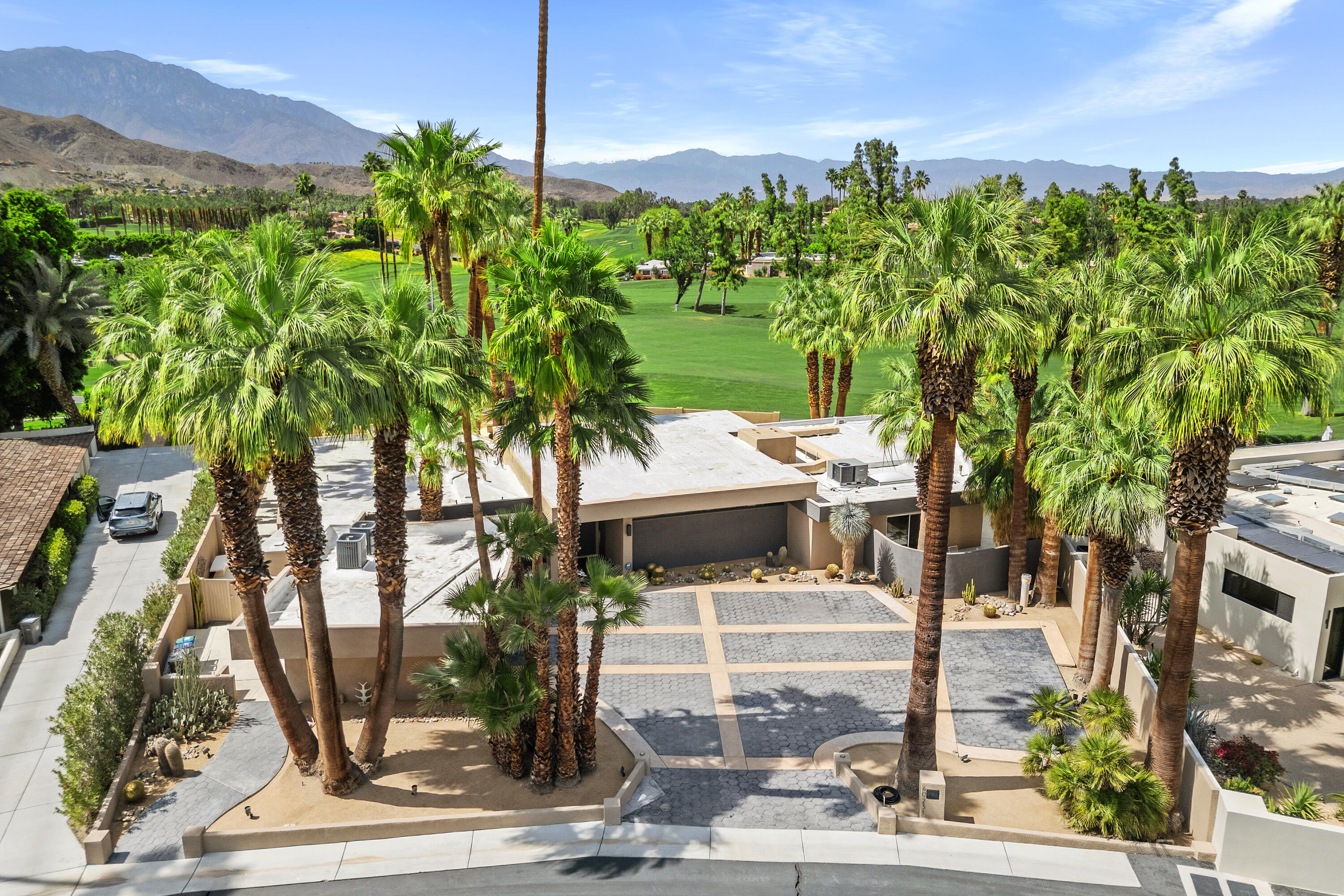40231 Club View Drive Rancho Mirage, CA 92270 - Photo 3 of 53 a view of a yard with plants