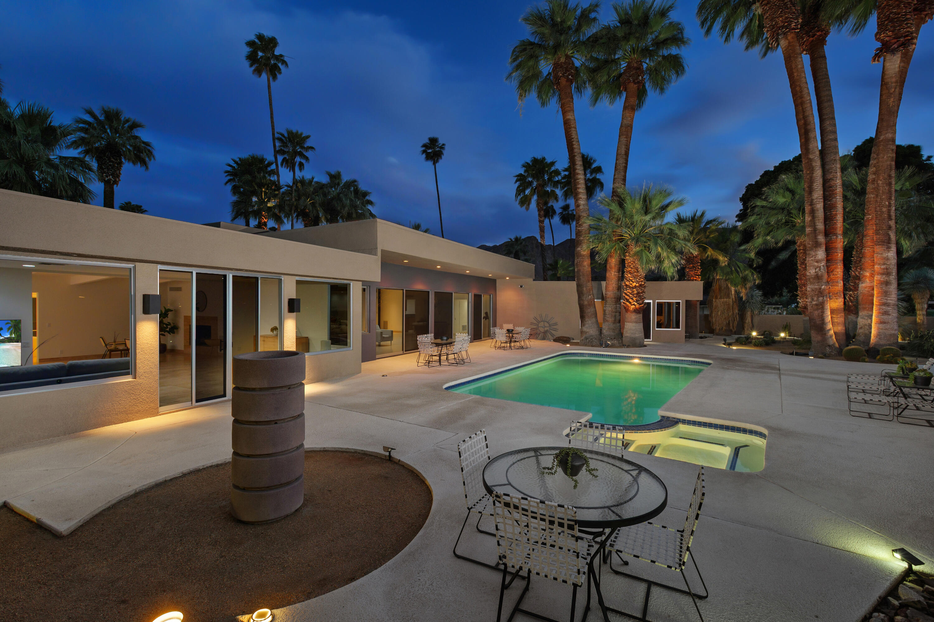 40231 Club View Drive Rancho Mirage, CA 92270 - Photo 45 of 53 a view of a house with swimming pool and porch with furniture