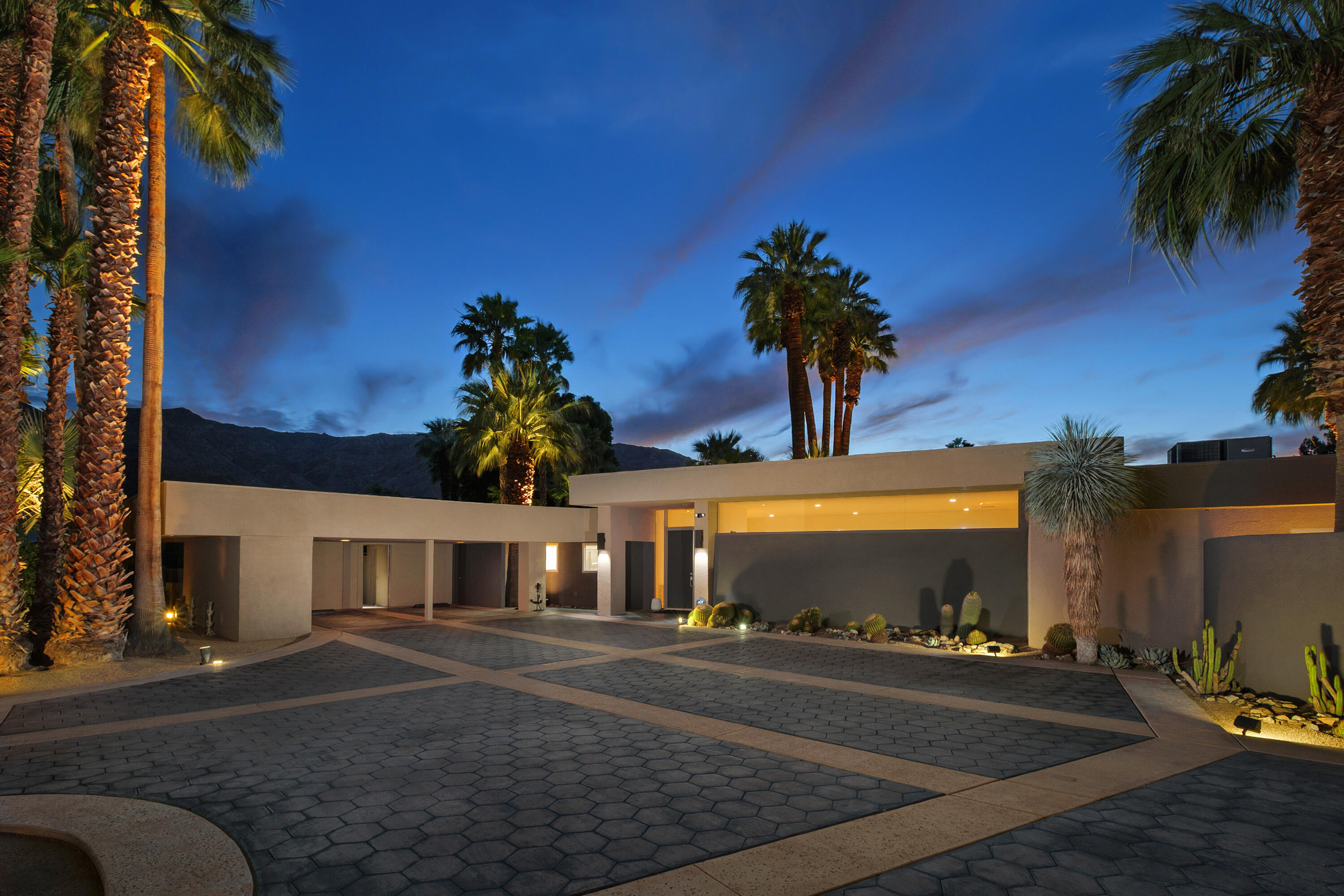 40231 Club View Drive Rancho Mirage, CA 92270 - Photo 5 of 53 a front view of a house with garden