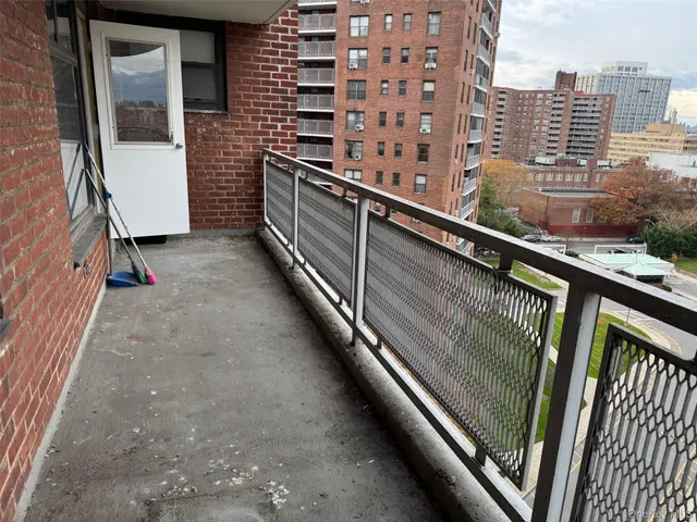 a city view from a balcony with city view