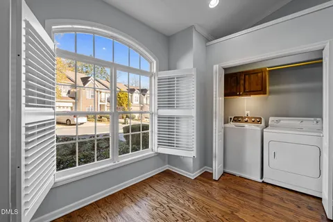 a kitchen with stainless steel appliances granite countertop wooden cabinets a stove top oven a sink and dishwasher