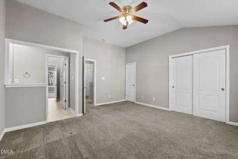 a view of storage and utility room with closet