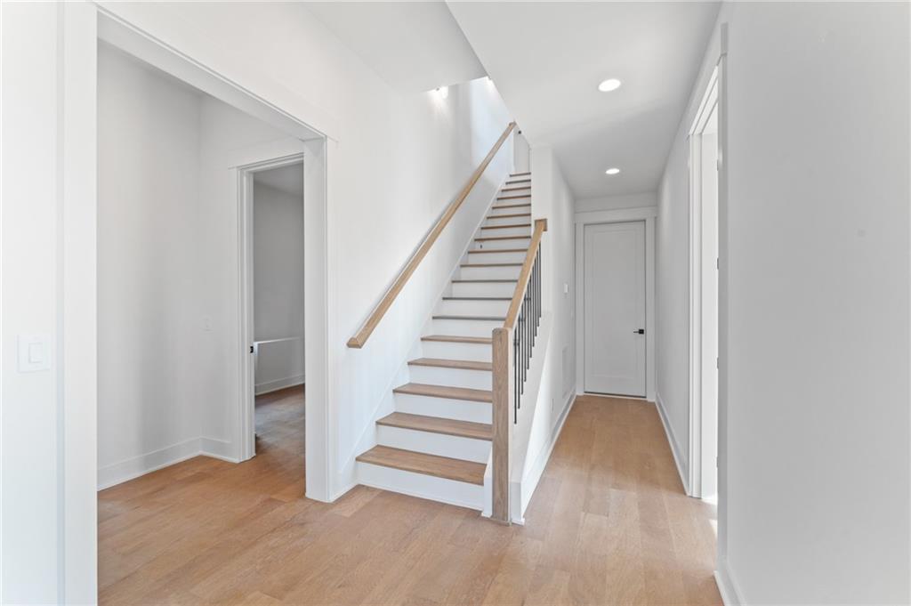 1090 Lupo Loop Chattahoochee Hills, GA 30268 - Photo 16 of 23 a view of entryway with wooden floor