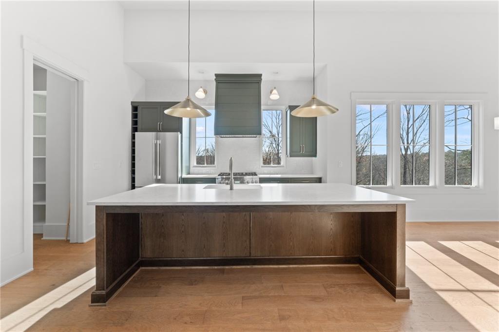 1090 Lupo Loop Chattahoochee Hills, GA 30268 - Photo 2 of 23 a bathroom with a sink and a mirror